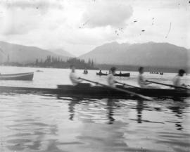 [Rowboats in harbour for regatta]