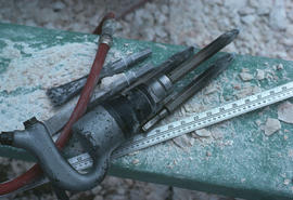 Stone tools - Close-up   of heavy gun with bush hammer and point