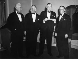 E.W. Hamber with three men at event for C.P.R. directors