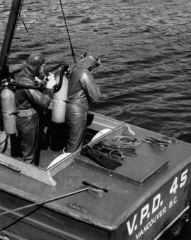 [Scuba divers about to dive from police launch V.P.D. 45]