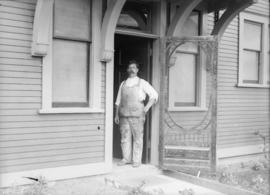 Man standing in door frame
