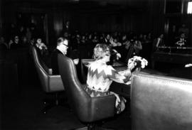 Backs of Boyce and Kennedy at inauguration of Mayor Art Phillips