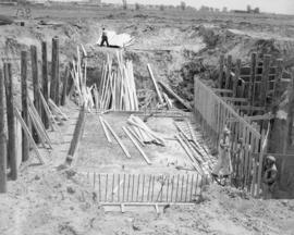 Beginning of erection of waste water pumphouse wall forms - looking south