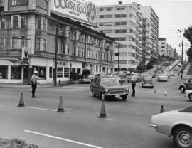 [Police officers directing traffic at corner of Georgia and Chilco Street]