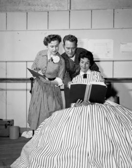 Alma Thery, James Johnston and Betty Phillips preparing for "The King and I"