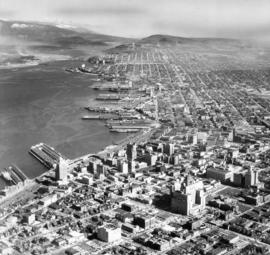 [Aerial view looking east of downtown Vancouver and the waterfront]