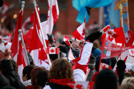 Day 52 Crowd cheer on the flame with Canadian flags of all sizes in Ontario.