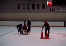 Children at indoor ice skating rink