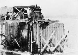 Three men on pier 2 caisson : September 2, 1924