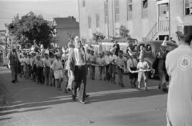 [Japanese men and boys in coronation parade]