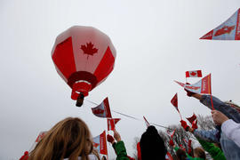 Day 26 Community Celebration crowd waits for the flame to arrive in Sussex, New Brunswick.