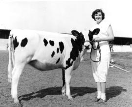 Shirley Savage and grand champion 4-H Holstein calf