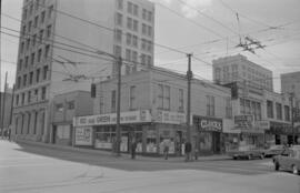 [Businesses at the intersection of West Pender Street and Richards Street - Red and Green Chinese...