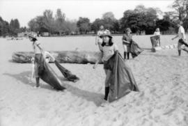 Girl Guides picking up litter from beach