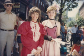 Two women wearing historical costumes