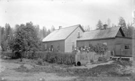 [Mr. and Mrs. Dagliesh and guests outside Dagliesh residence at Jericho]