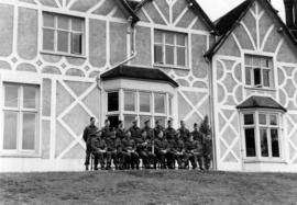 Officer group photo at Brigade Headquarters in an English country house