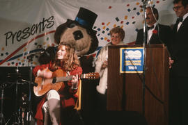 Megan Metcalfe performing on stage at Vancouver's 99th birthday celebration at the Vancouver Museum