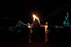 Day 106 Torchbearer 8 Ann Duffy (R) passes the flame to Torchbearer 9 Robert C. Meredith (L) at P...