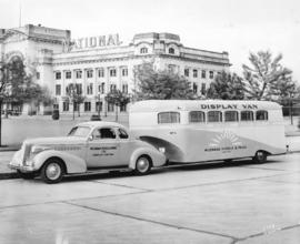 [The McLennan, McFeely and Prior display car and van near the Canadian National Railway Station]