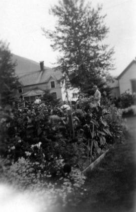 Skagway [Alaska - L.D. Taylor in garden]