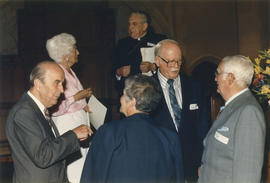 21 Club reunion attendees and priest at St. Andrew's Wesley Church