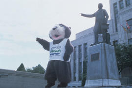 Tillicum imitating Captain George Vancouver statue at Vancouver City Hall