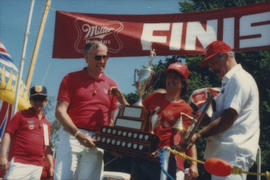 Award presentation at finish line