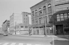 [View west down north side of unit block of Water Street from Alexander Street]