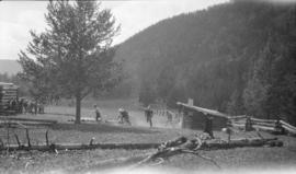 Hikers running around ranch area