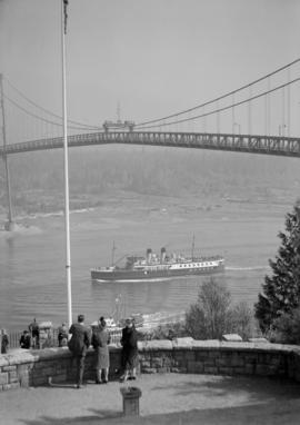 Boom of logs under Lion's Gate Bridge, Prospect Point monument