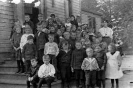 Group of six year old boys and girls with teacher School near Marine Drive