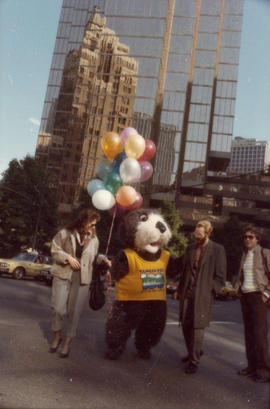 Tillicum with group of people in downtown Vancouver