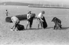 Girl Guides picking up litter from beach