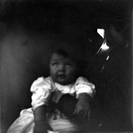[Annie Louise Taylor holding Theodore Taylor]