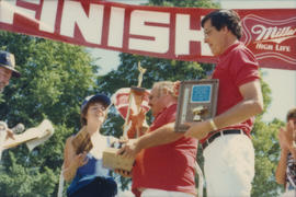 Award presentation at finish line