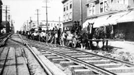 Construction work for streetcar track on Pender Street