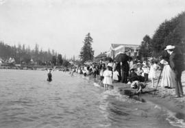 [A crowd on English Bay Beach]