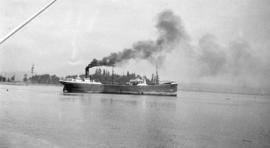 [Freight ship leaving Coal Harbour]