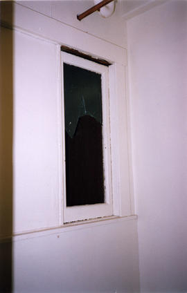 Broken window of Balmoral Hotel at 159 East Hastings Street