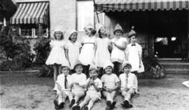 Group of children in party hats