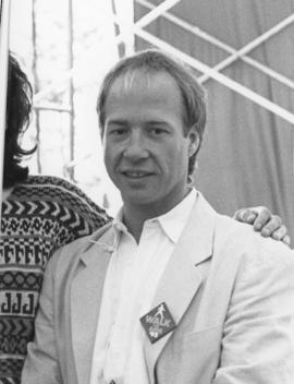 Portrait of unidentified man wearing Walk for AIDS 1992 pin