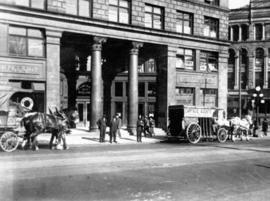 Partial street view of the Dominion Trust building, 207 Hastings Street