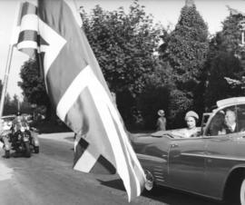 [H.R.H. Princess Margaret is accompanied in a car by Lieutenant Governor Frank Ross]
