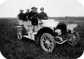 [Dr. A.R. Baker at the wheel of his Model "S" Oldsmobile]