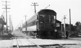 [Two coupled interurban cars] at station on the B.C.E.R. Central Park lines