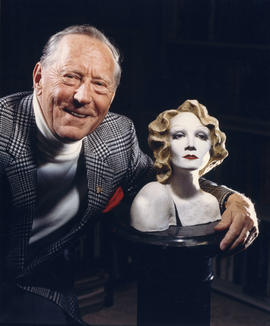 Hugh Pickett with bust of Marlene Dietrich
