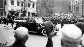 [King George VI and Queen Elizabeth in car]