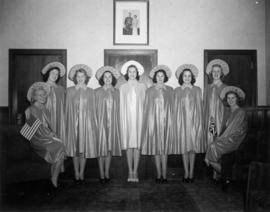 Portland Rose Festival Queen, Betty Jane Harding, and court of eight attendants at tea party