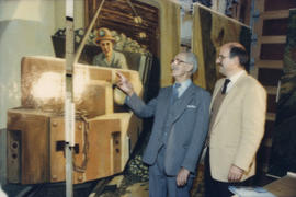 Fraser Wilson and Mike Harcourt looking at mural